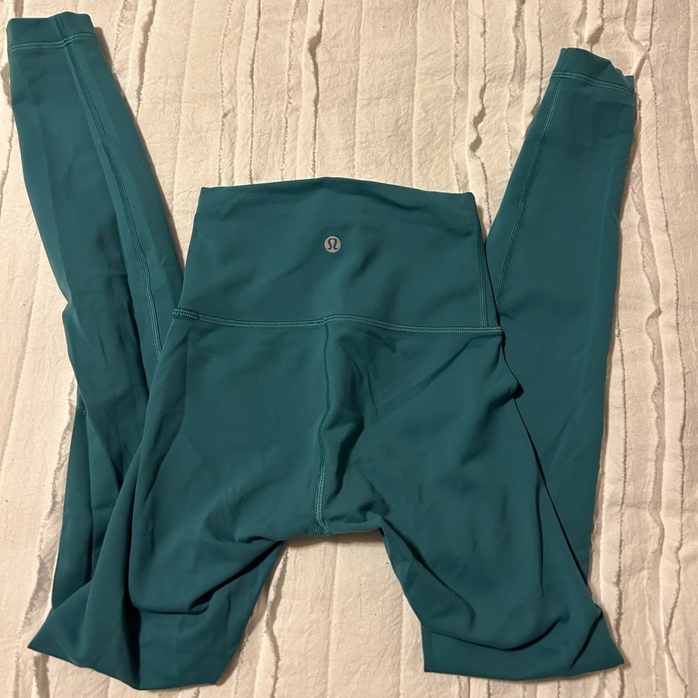 a dark aqua color, lululemon leggings